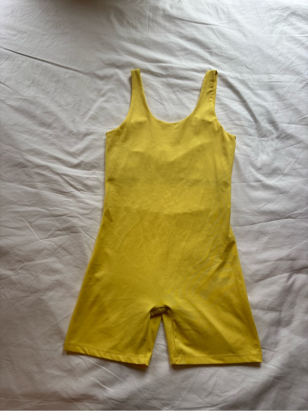 Girlfriend Collective Bike Unitard in discontinued butter yellow